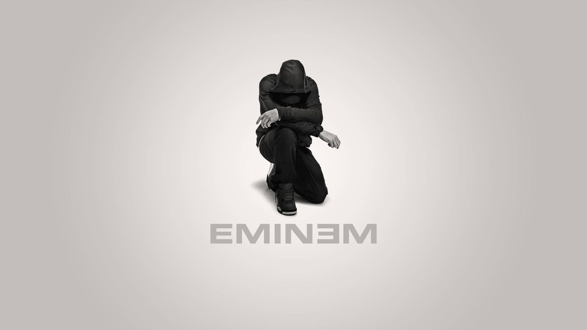 Kneeling Eminem In Black Background