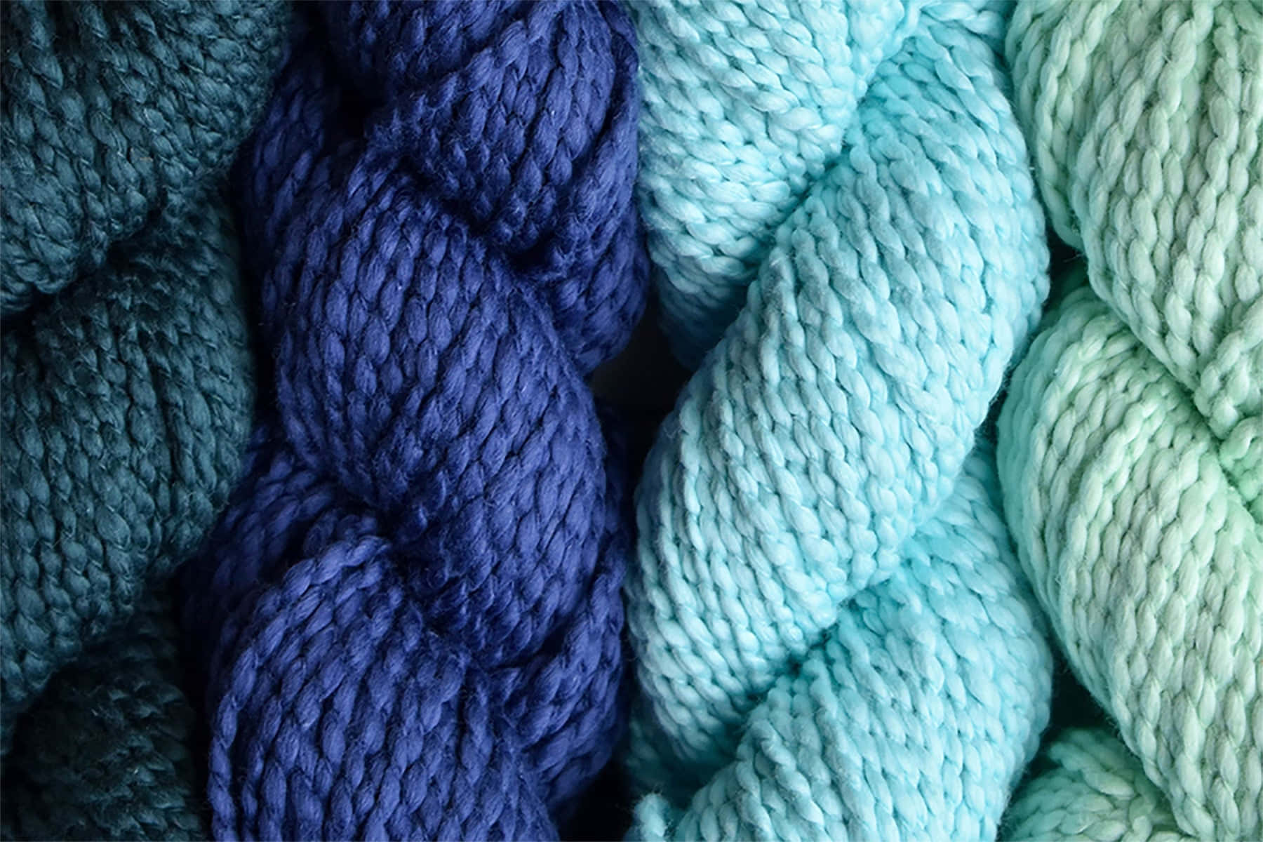 Knitting Yarns In Shades Of Blue Background