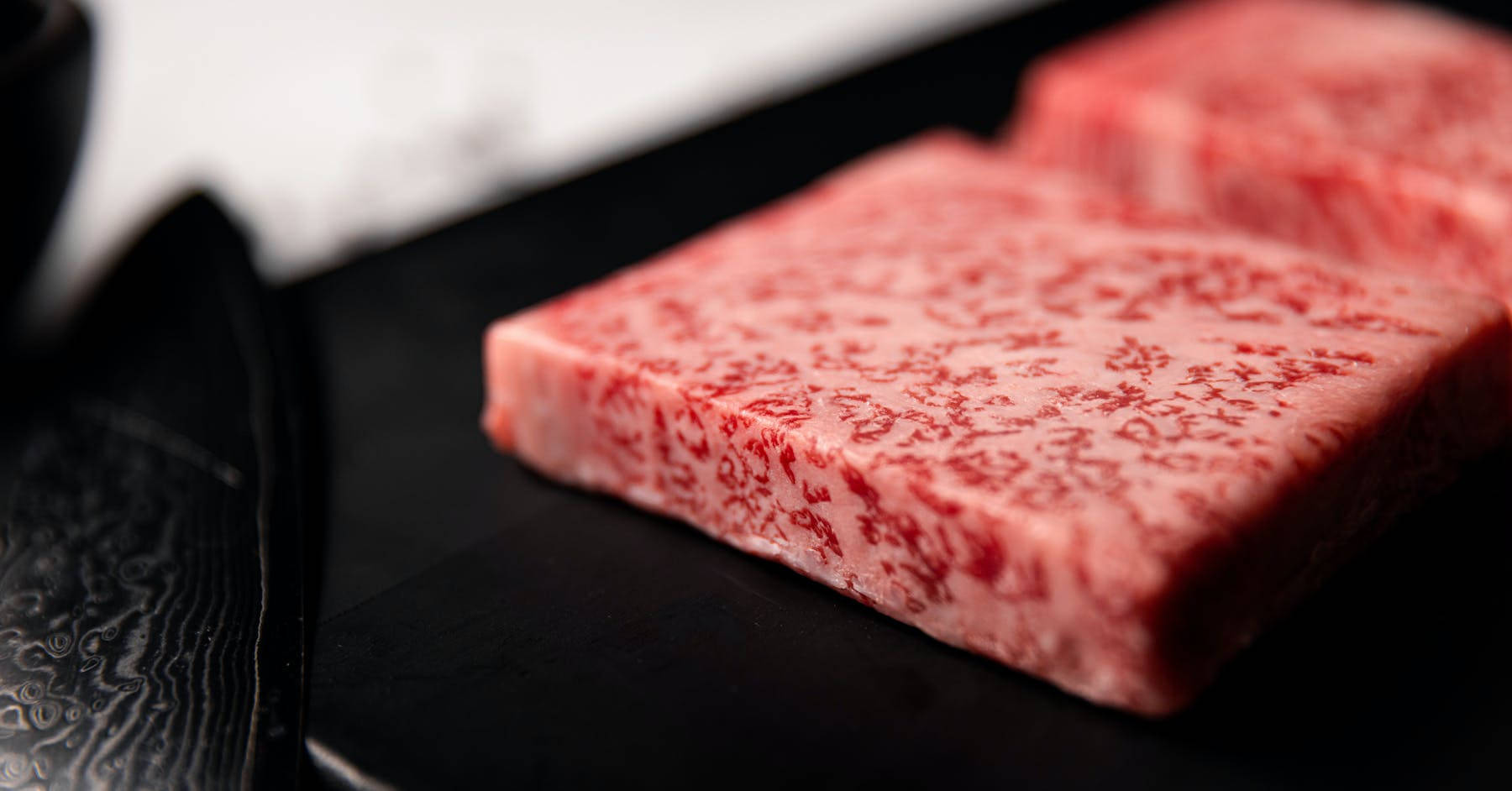 Kobe Beef Sliced And Trimmed Background