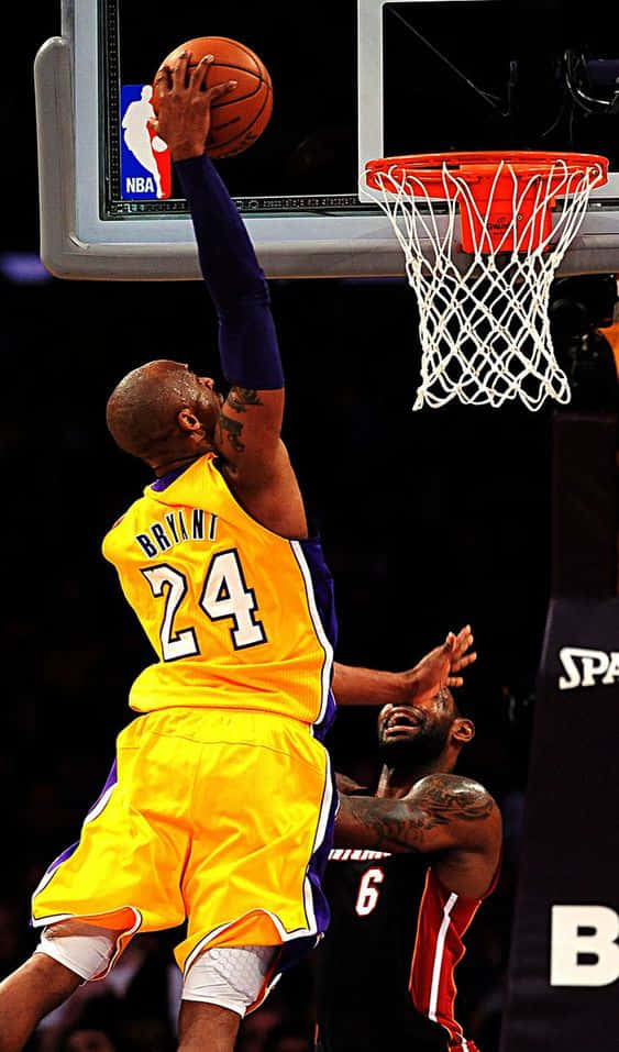 Kobe Bryant Demonstrating One Of His Trademark Dunks. Background