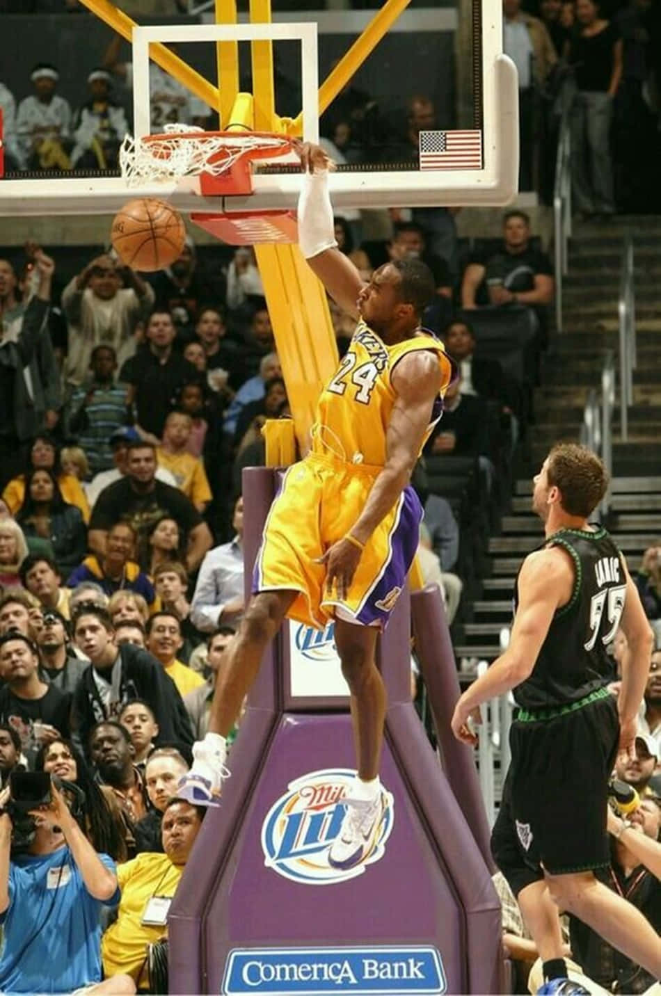 Kobe Bryant Performing An Iconic Dunk Background