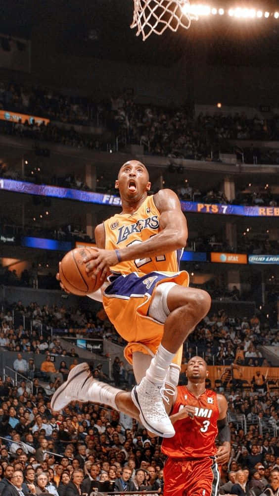 Kobe Bryant Showing Off The Athleticsm That Made Him A Legend Background
