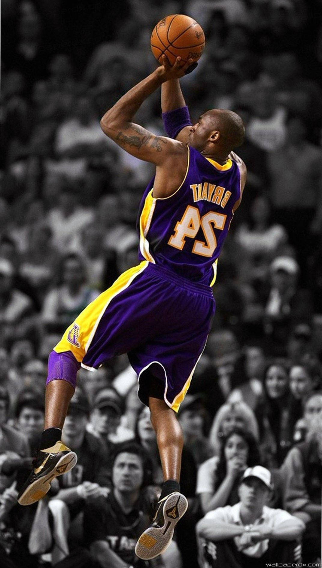 Kobe Bryant Stands With An Iphone Background