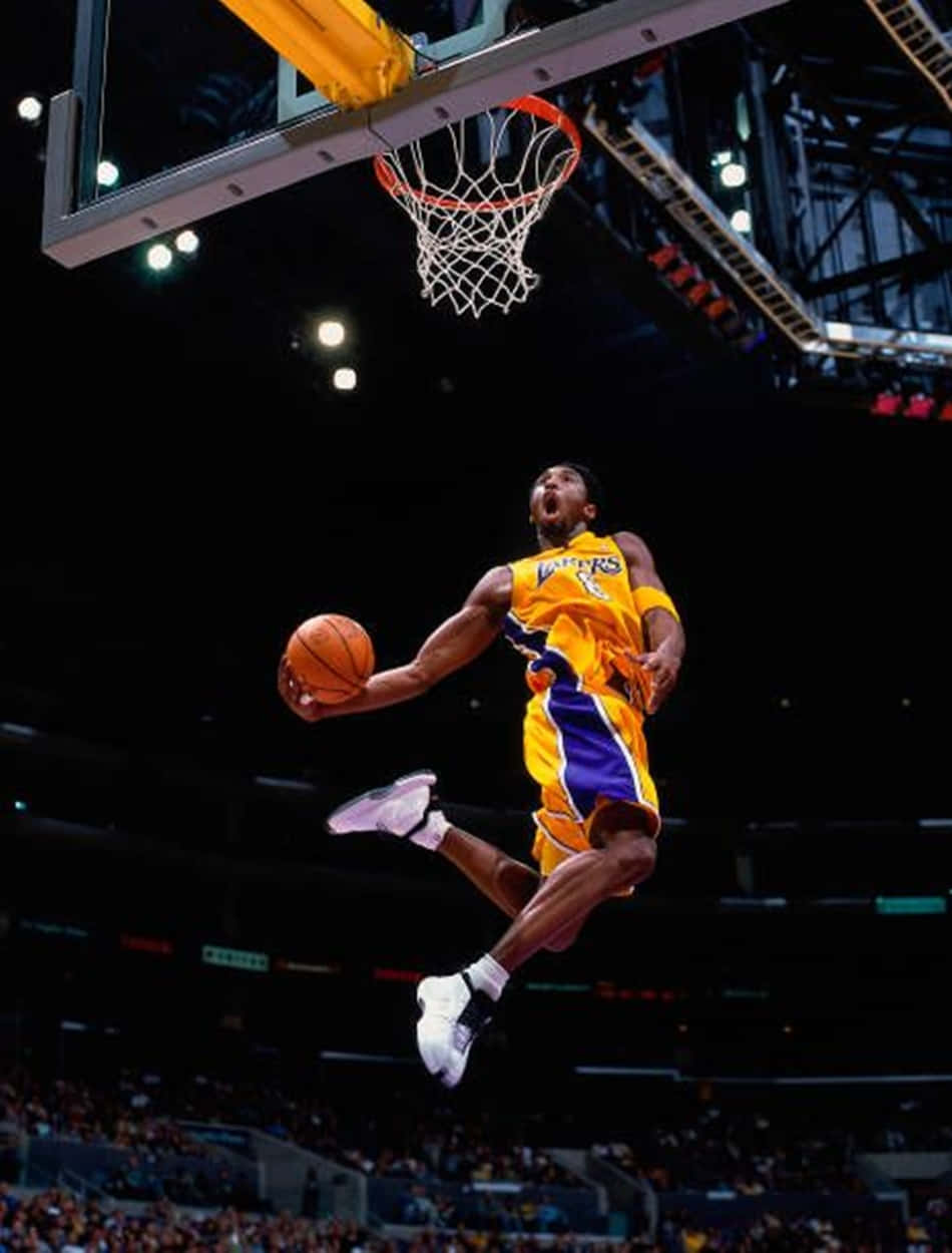 Kobe Bryant Taking Flight On The Hardwood. Background