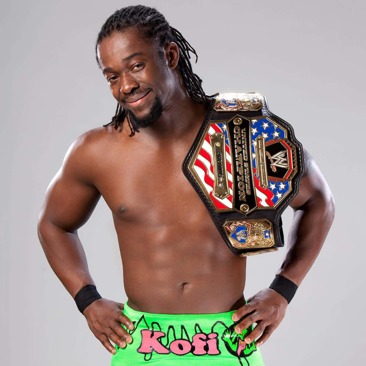 Kofi Kingston Posing With His Wwe Belt