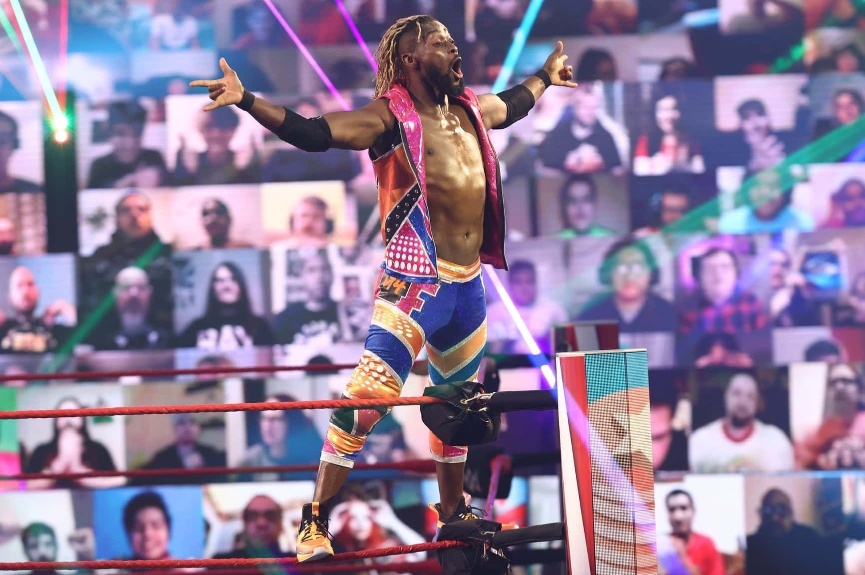 Kofi Kingston Standing By The Ring Post Background