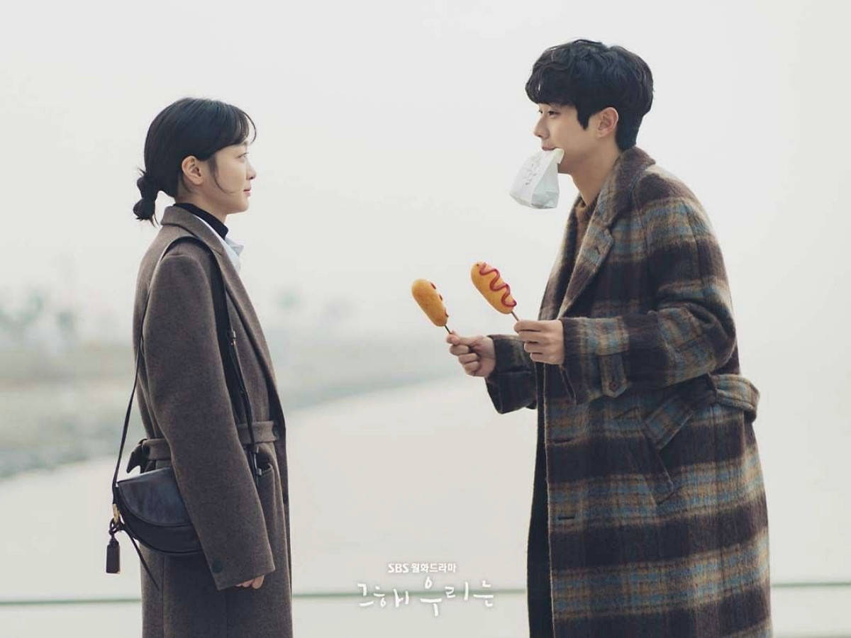 Korean Actor Choi Woo Shik Enjoying A Corndog Date Background