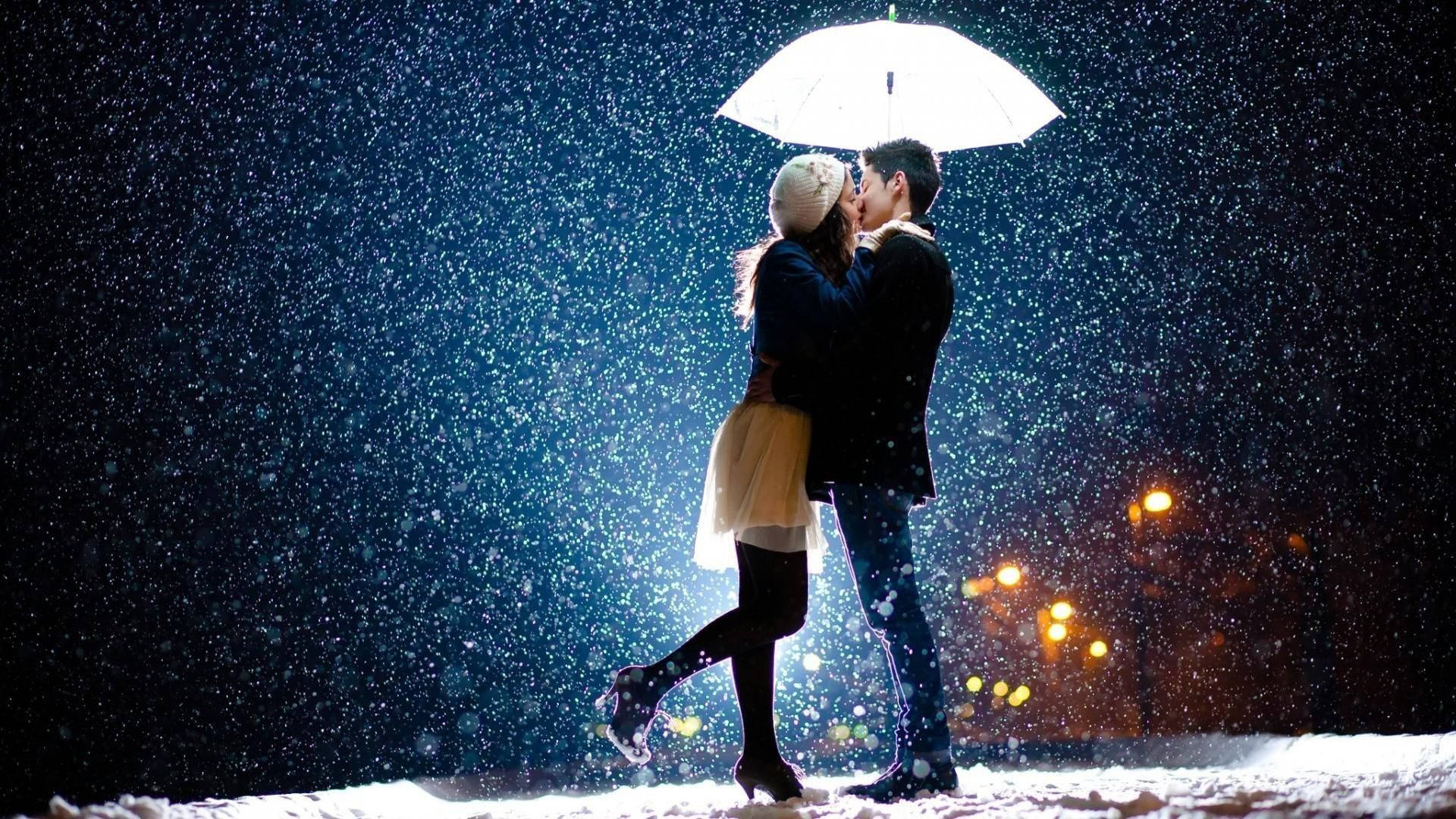 Korean Couple Kissing Amid Snowfall Background