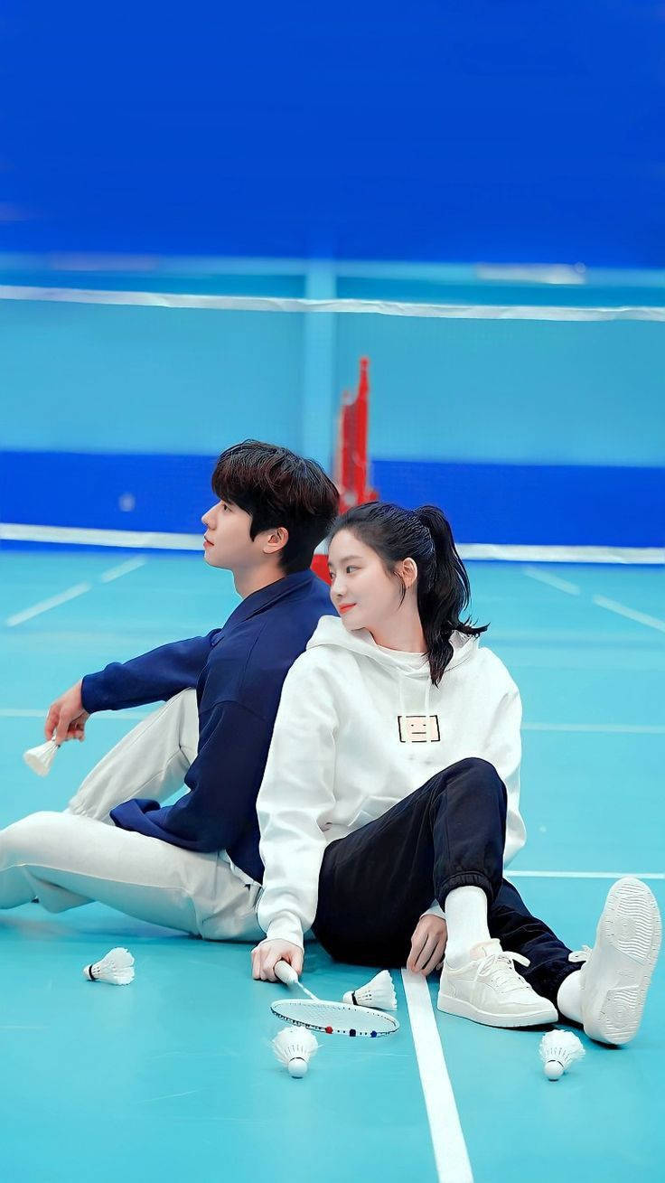 Korean Couple On The Badminton Court Background