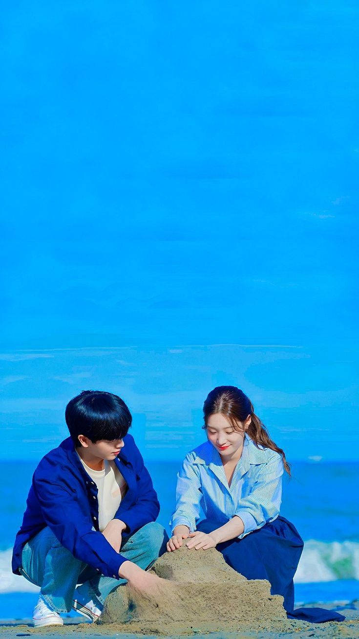 Korean Couple Playing Sand Background