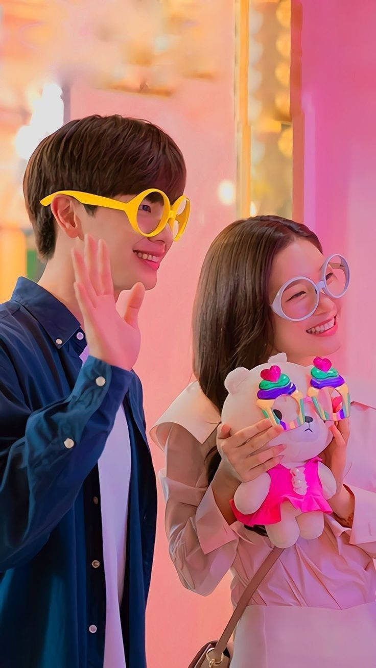 Korean Couple Wearing Colored Eyeglasses Background