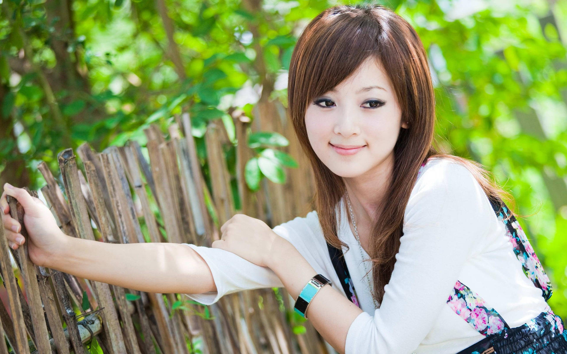 Korean Girl Posing Near Bamboo Fence