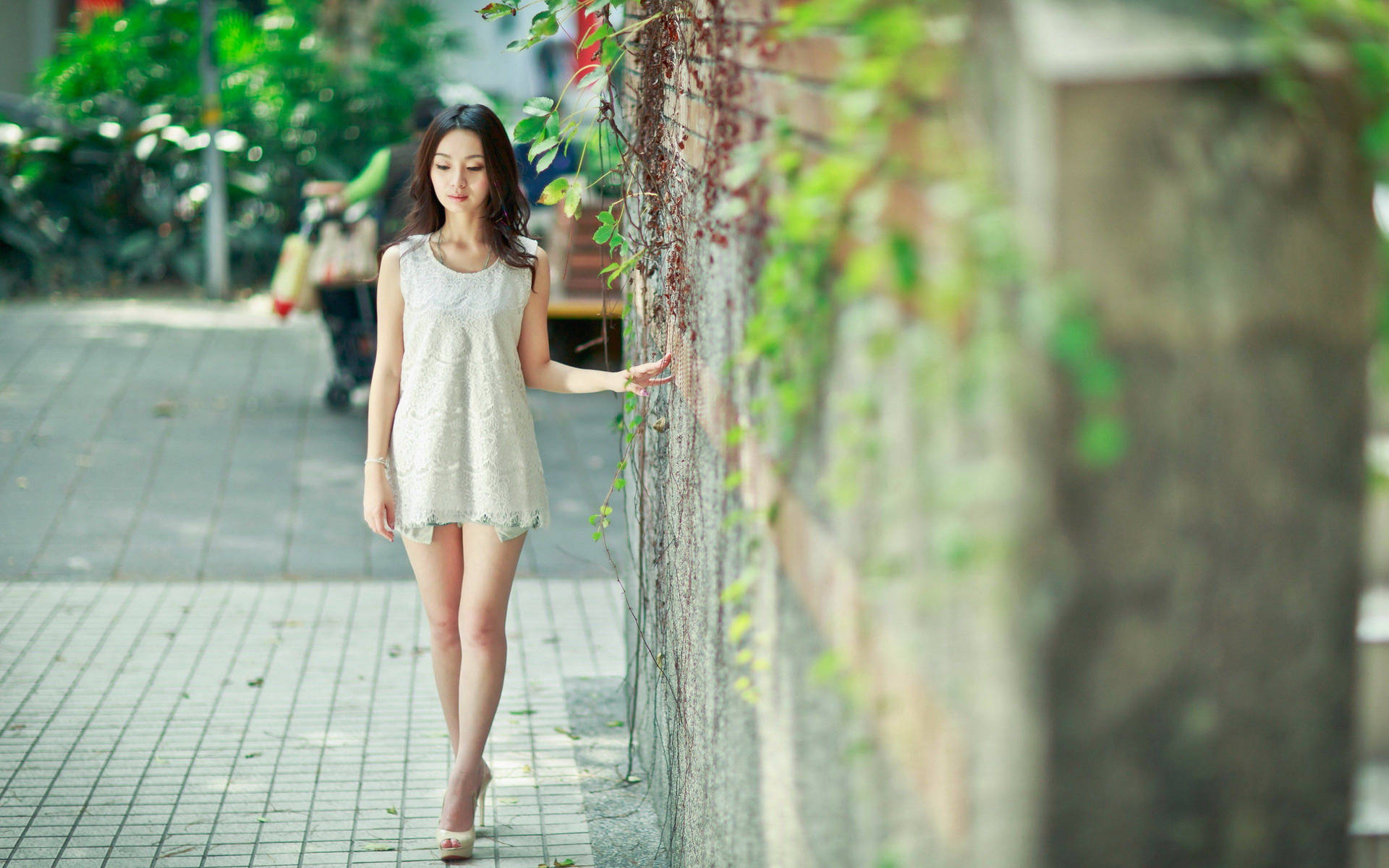 Korean Girl Walking Down The Street Background