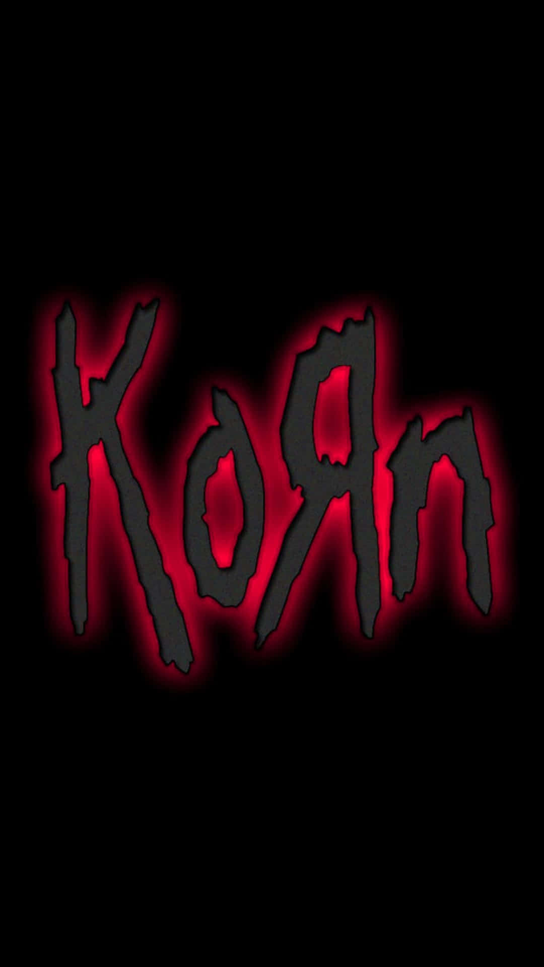 Korn Logo On A Black Background Background