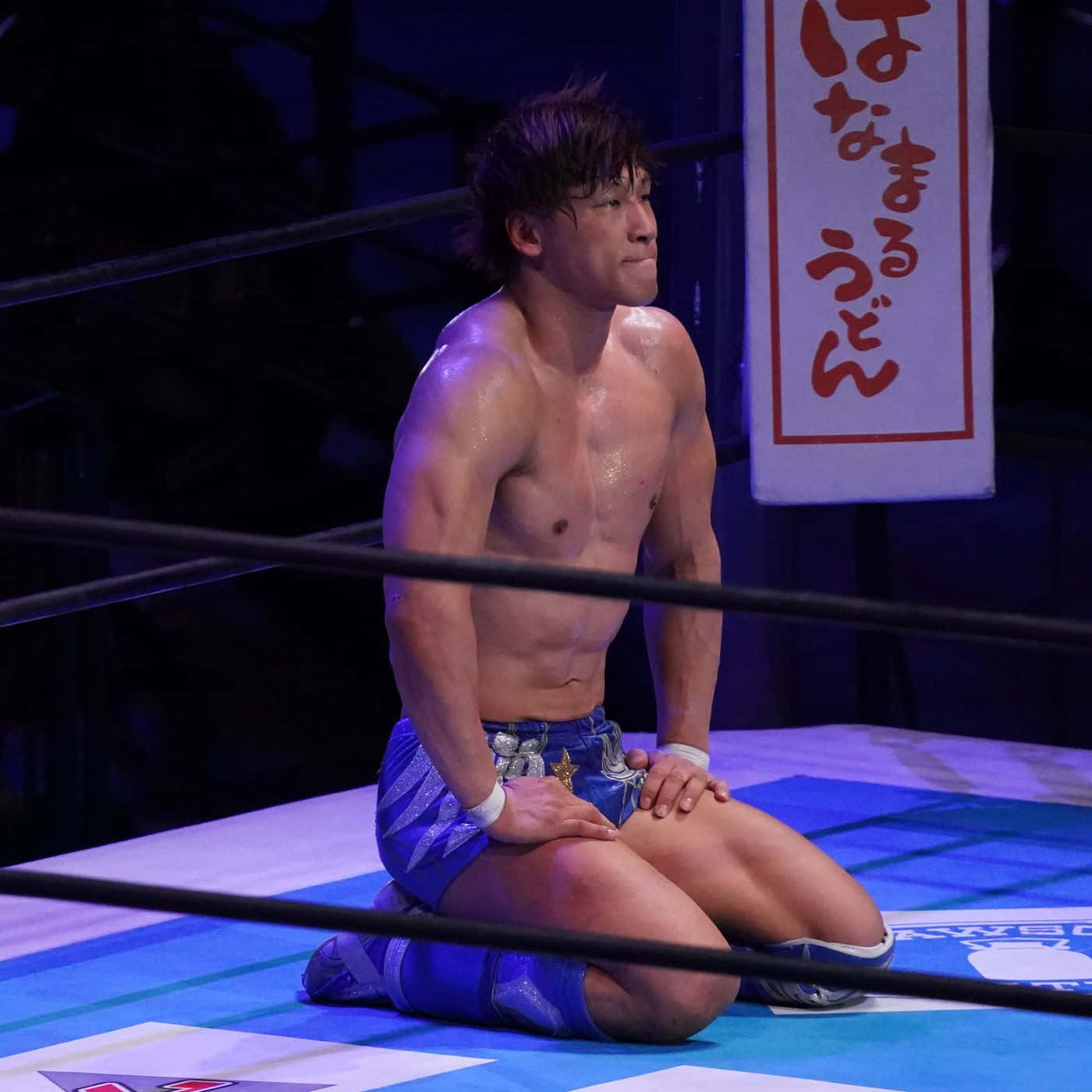Kota Ibushi Seiza Sitting On The Ring Background