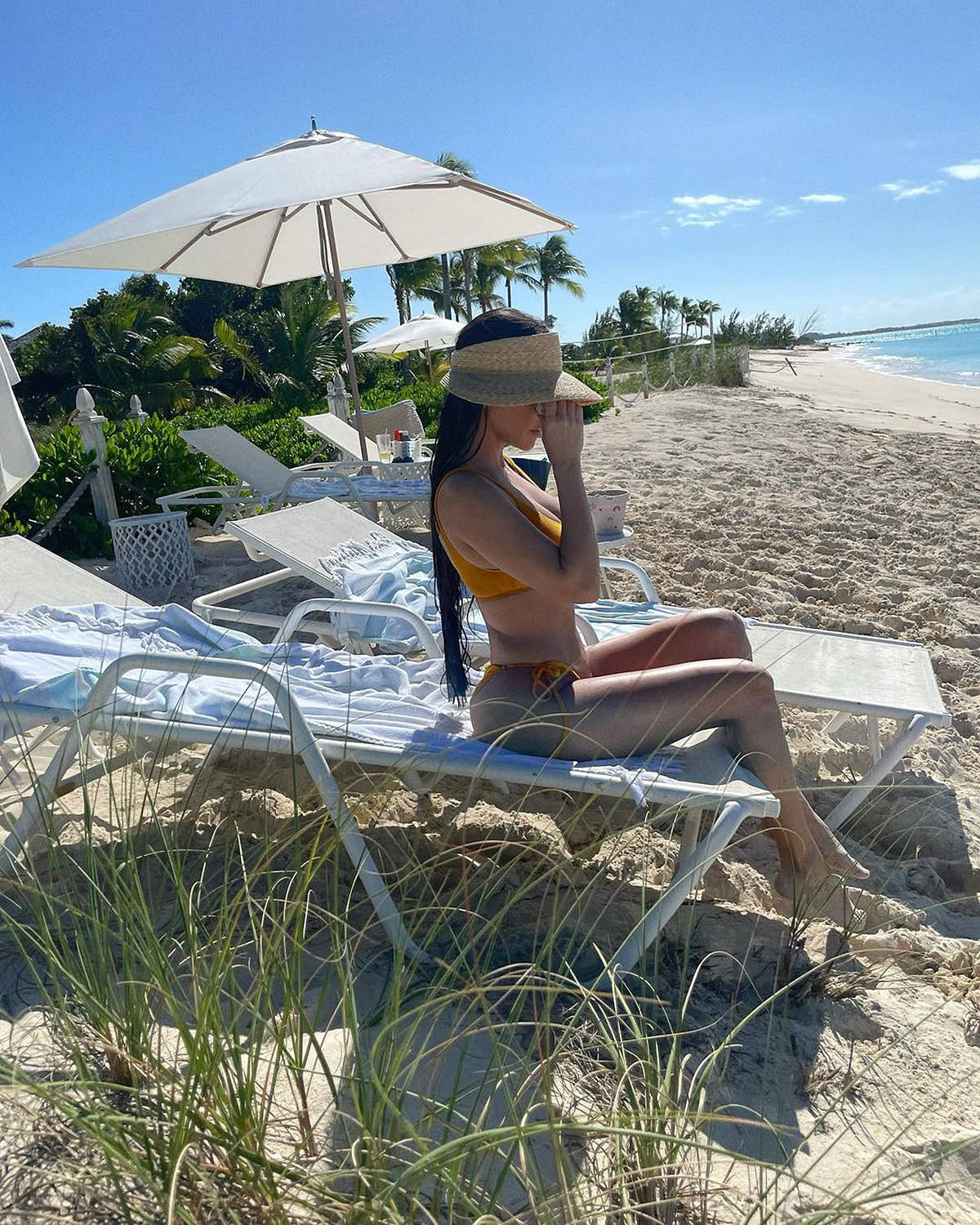 Kourtney Kardashian At The Seashore Background