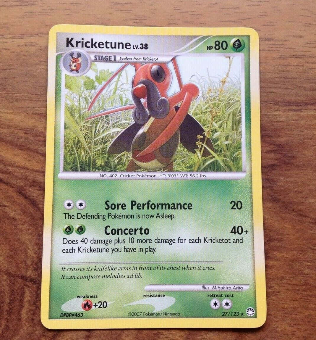 Kricketune Pokemon Trading Card Wooden Background