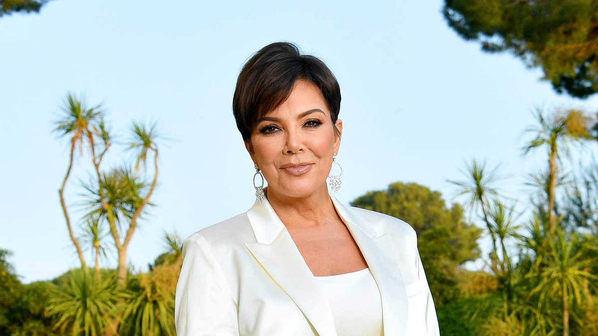 Kris Jenner White Outfit Background