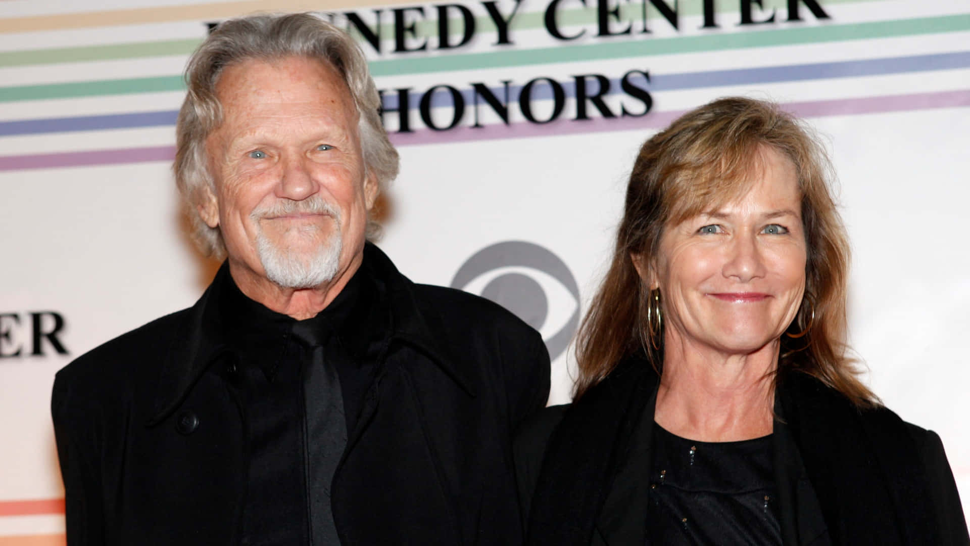 Kris_ Kristofferson_at_ Event_with_ Companion Background