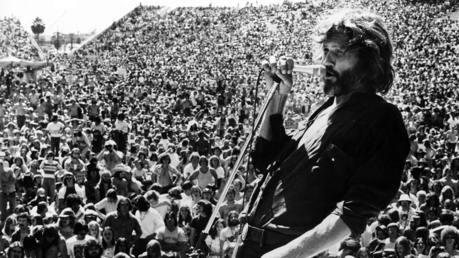 Kris Kristofferson Live Concert Performance Background