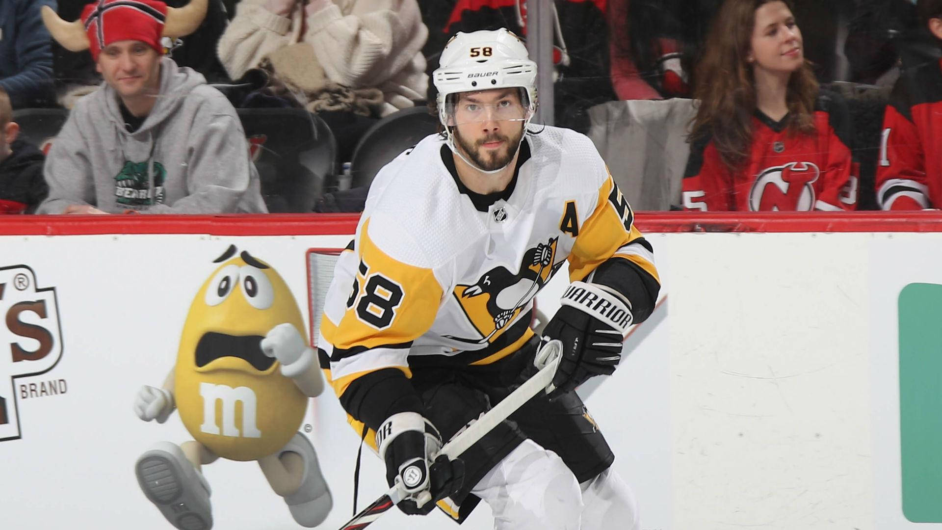 Kris Letang In Action On The Ice Background