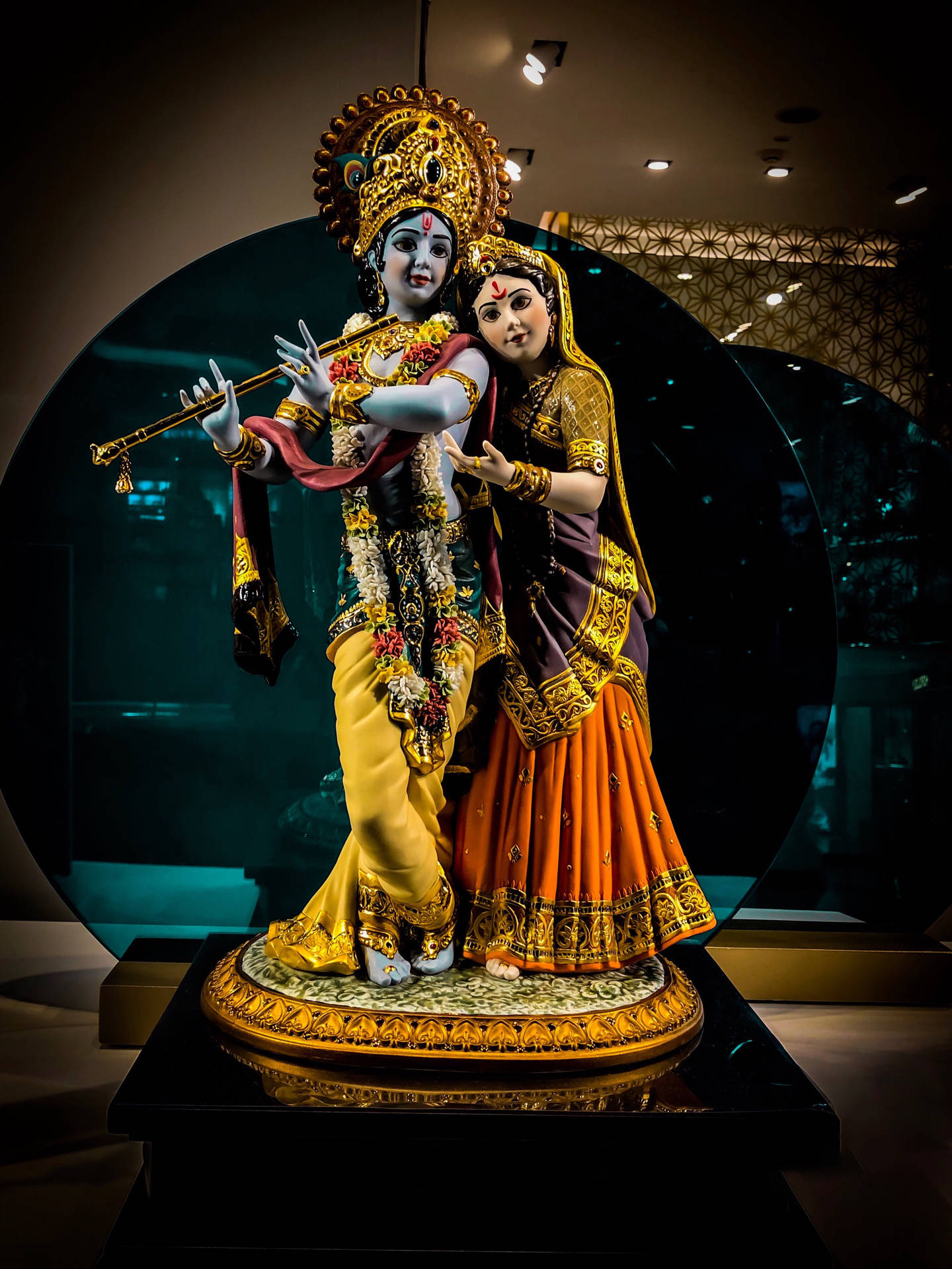 Krishna Iphone Statue In Museum Background