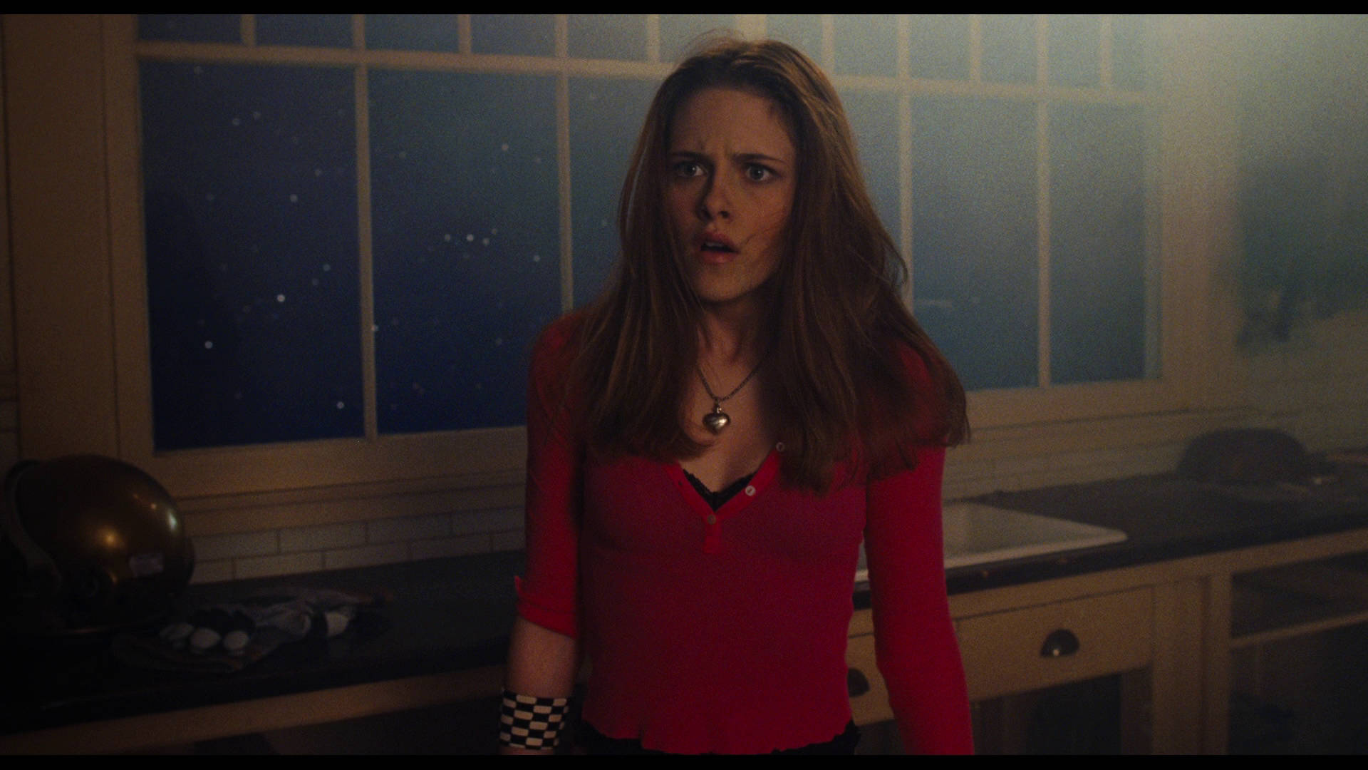 Kristen Stewart Glows In Striking Red Outfit Background