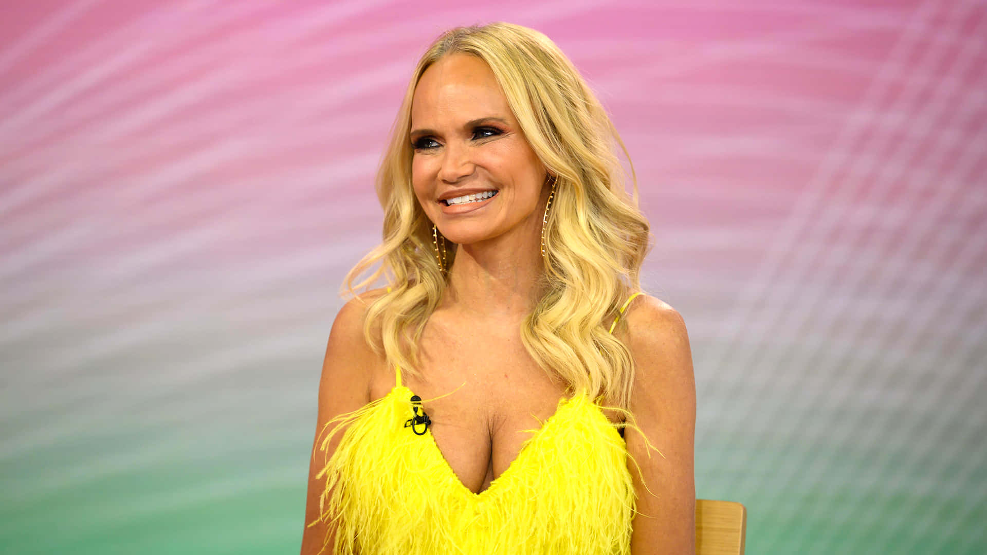 Kristin Chenoweth Strikes A Pose In Stunning Attire Background