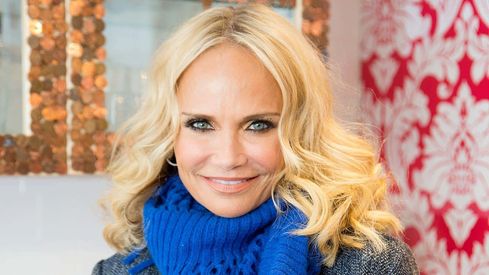 Kristin Chenoweth Striking A Pose In A Stunning Red Dress Background