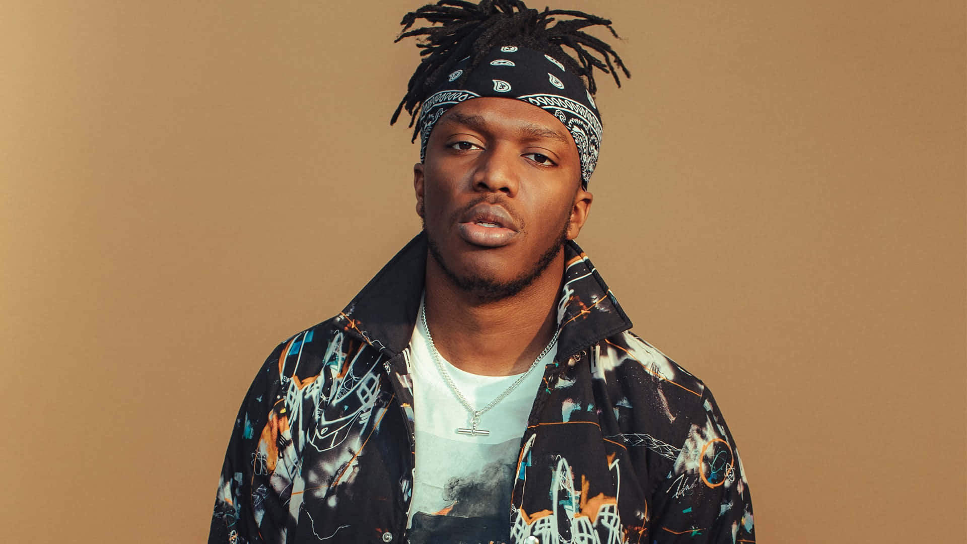 Ksi With Brown Background Background