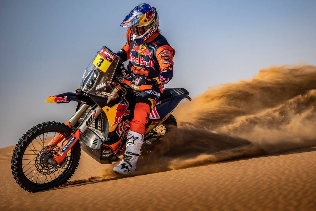 Ktm 450 Rally Motorcycle Dominating The Dakar Background