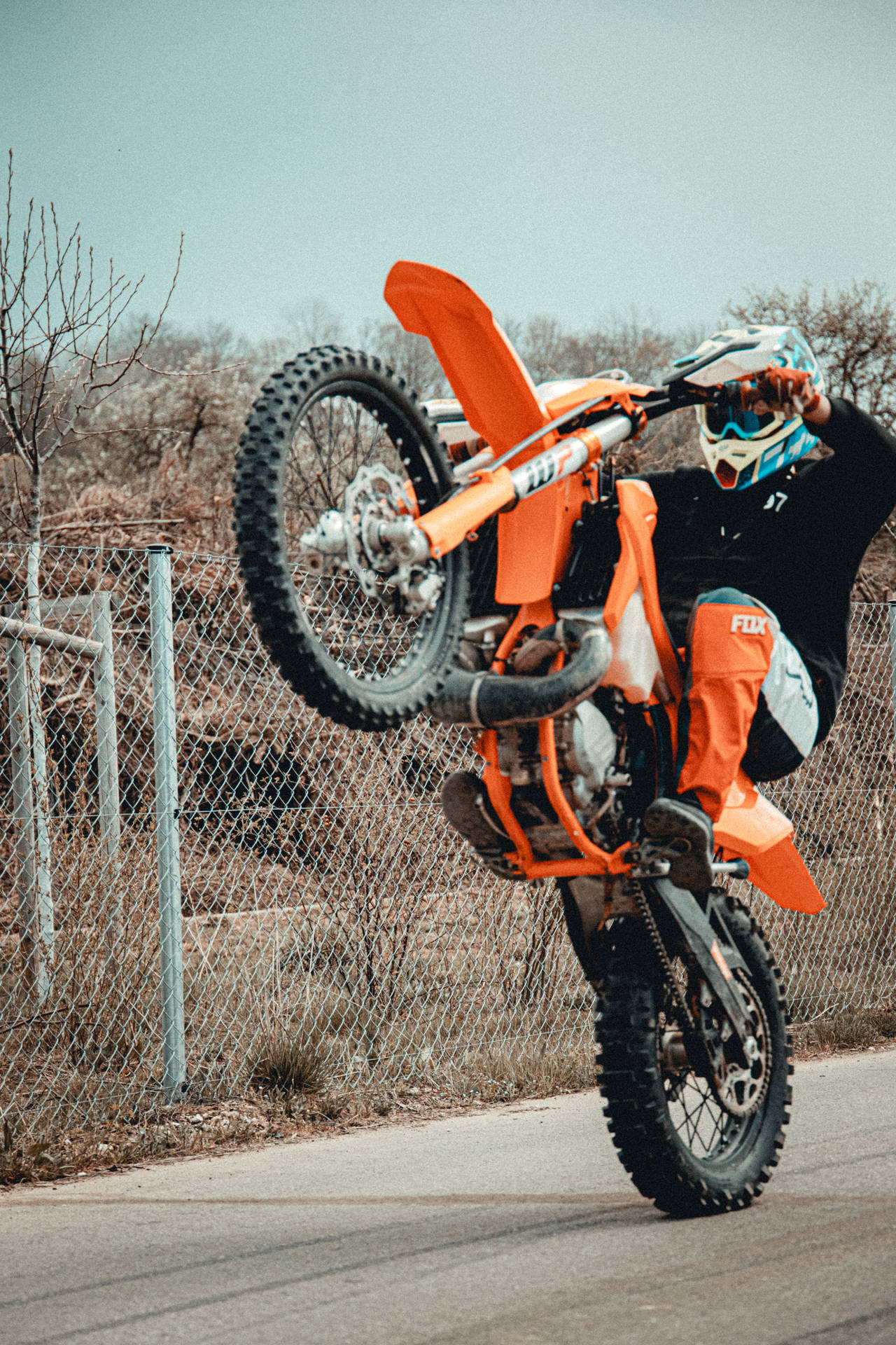 Ktm Bike During Wheelie Background