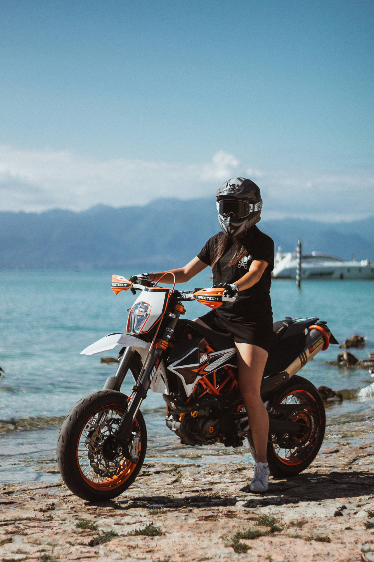 Ktm Biker On The Beach Background