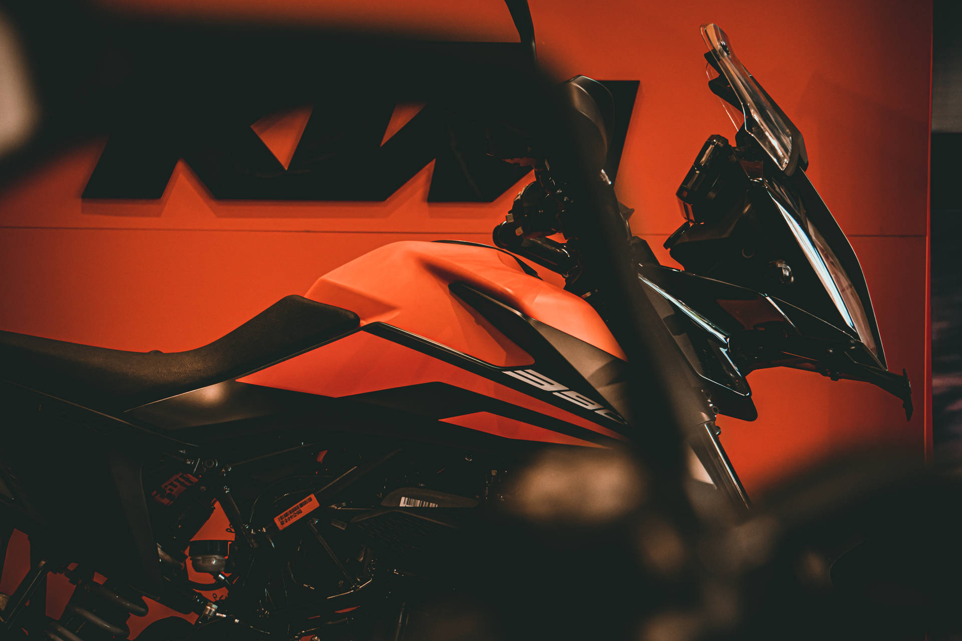 Ktm Duke 200 In A Ktm Shop Background