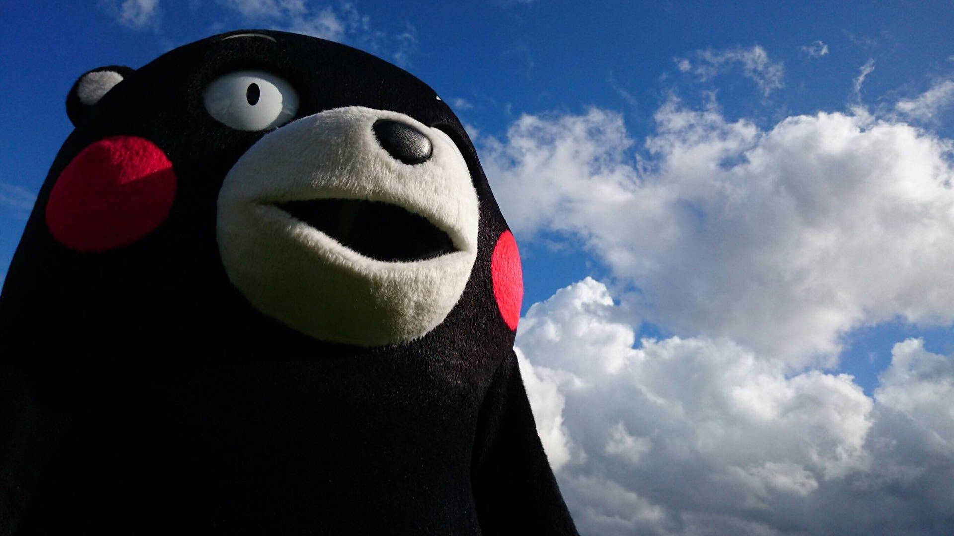 Kumamon Mascot Under The Sky Background