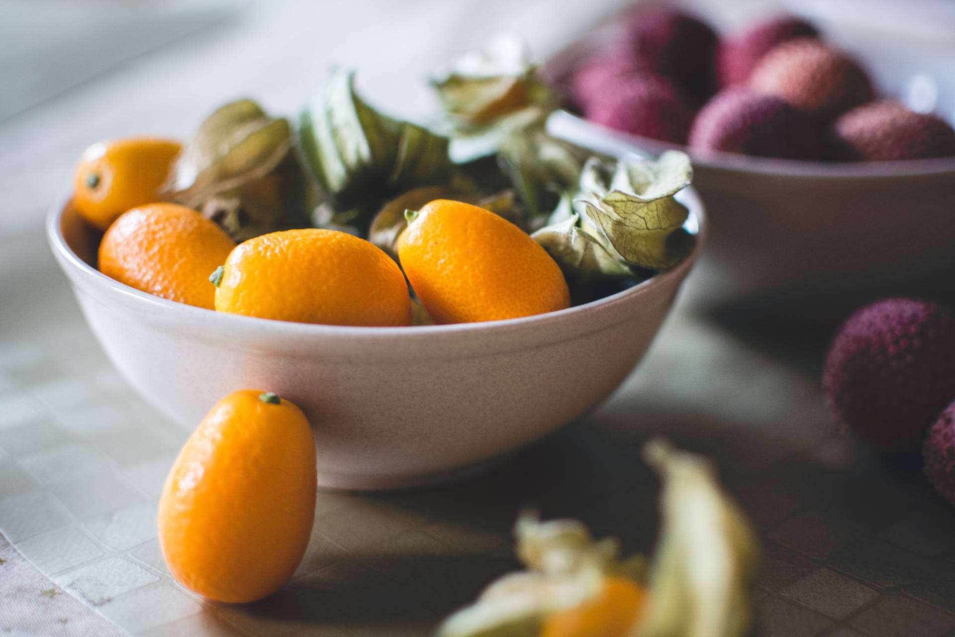 Kumquat And Lychee Fruits On Bowl