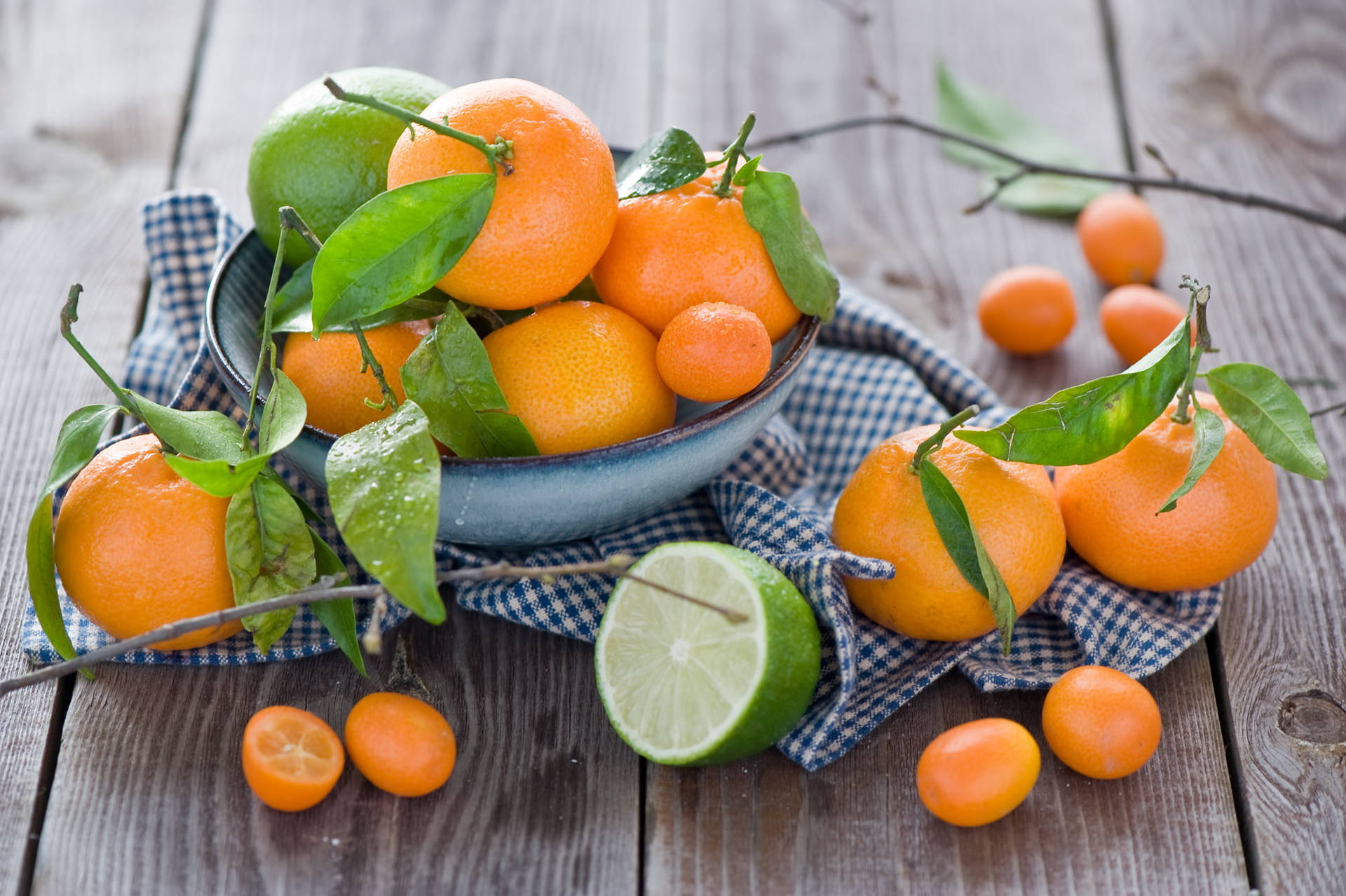 Kumquat Fruit With Limes And Oranges