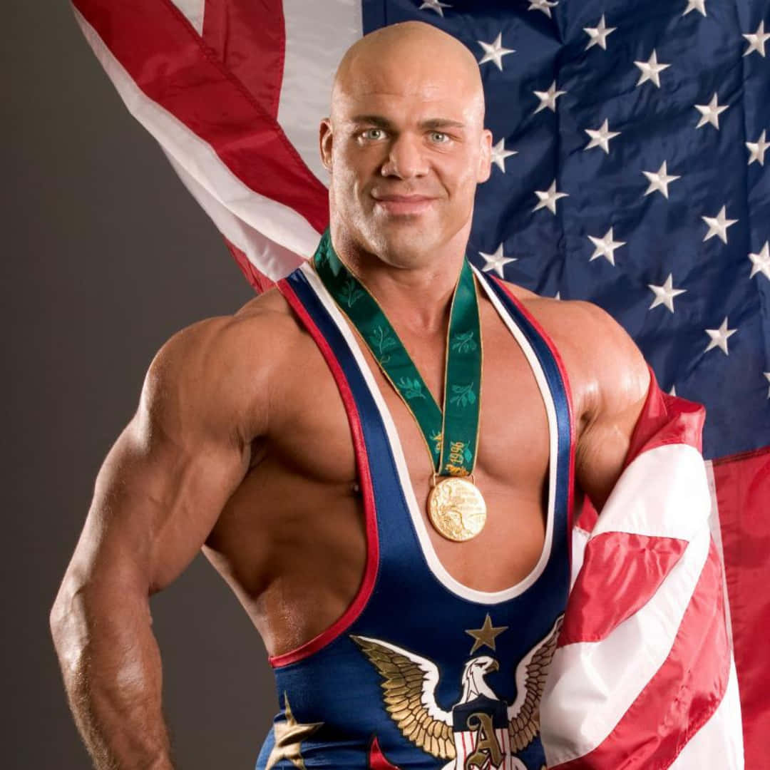 Kurt Angle Proudly Holding His Olympic Gold Medal Background