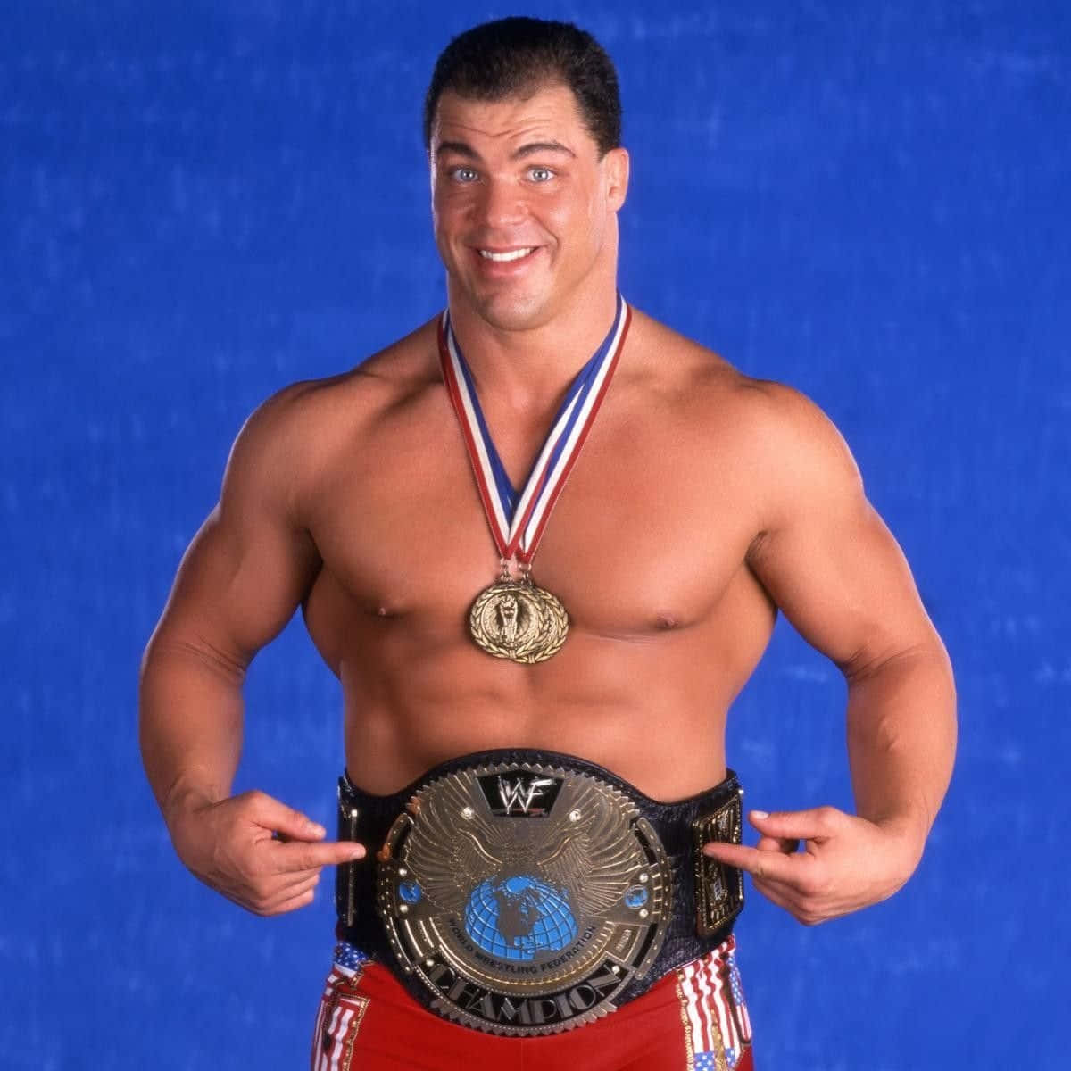Kurt Angle Triumphantly Holding The Wwf Championship Belt Background