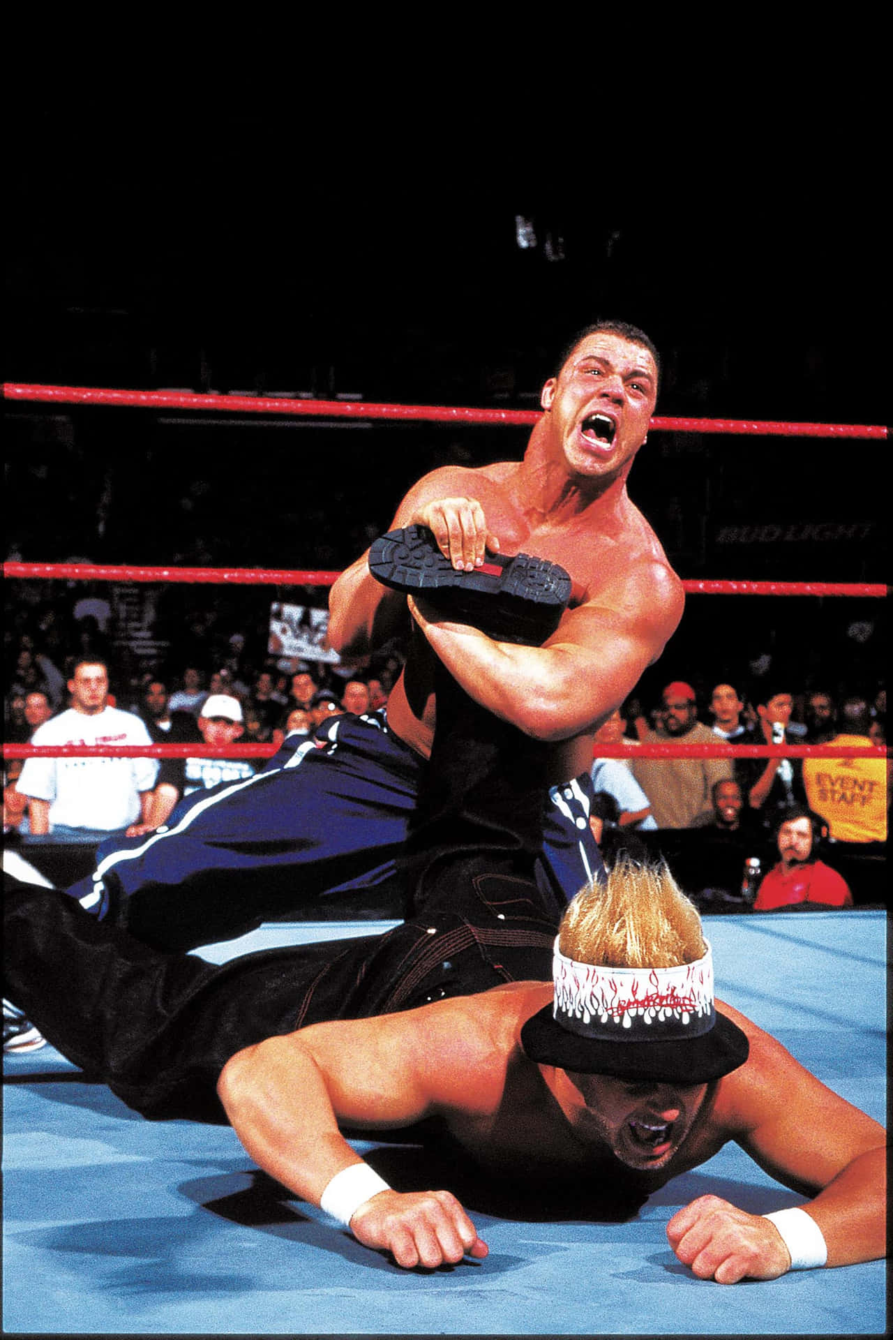 Kurt Angle Wearing Blue Track Pants Background