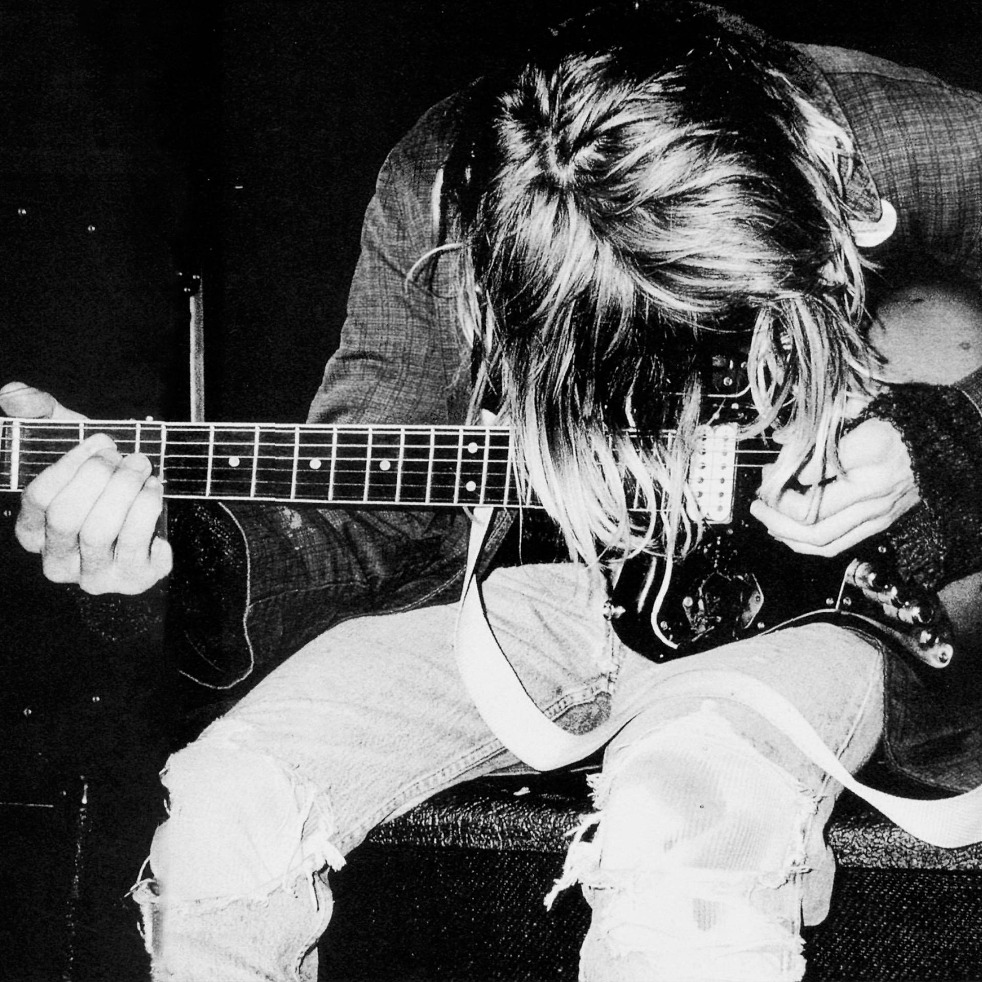Kurt Cobain Over Guitar Background