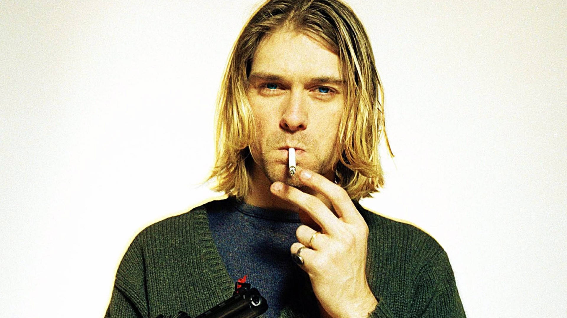 Kurt Cobain Smoking With Gun Background