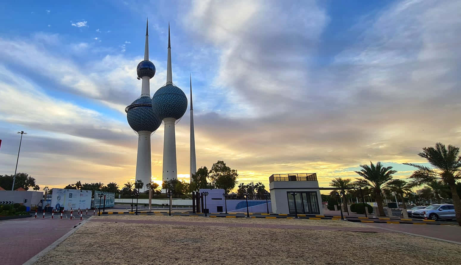 Kuwait Towers Beneath Blue Yellow Sky Background