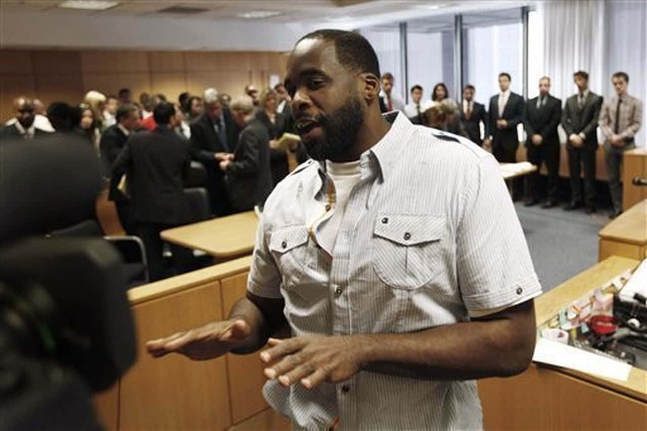 Kwame Kilpatrick During Press Conference Background