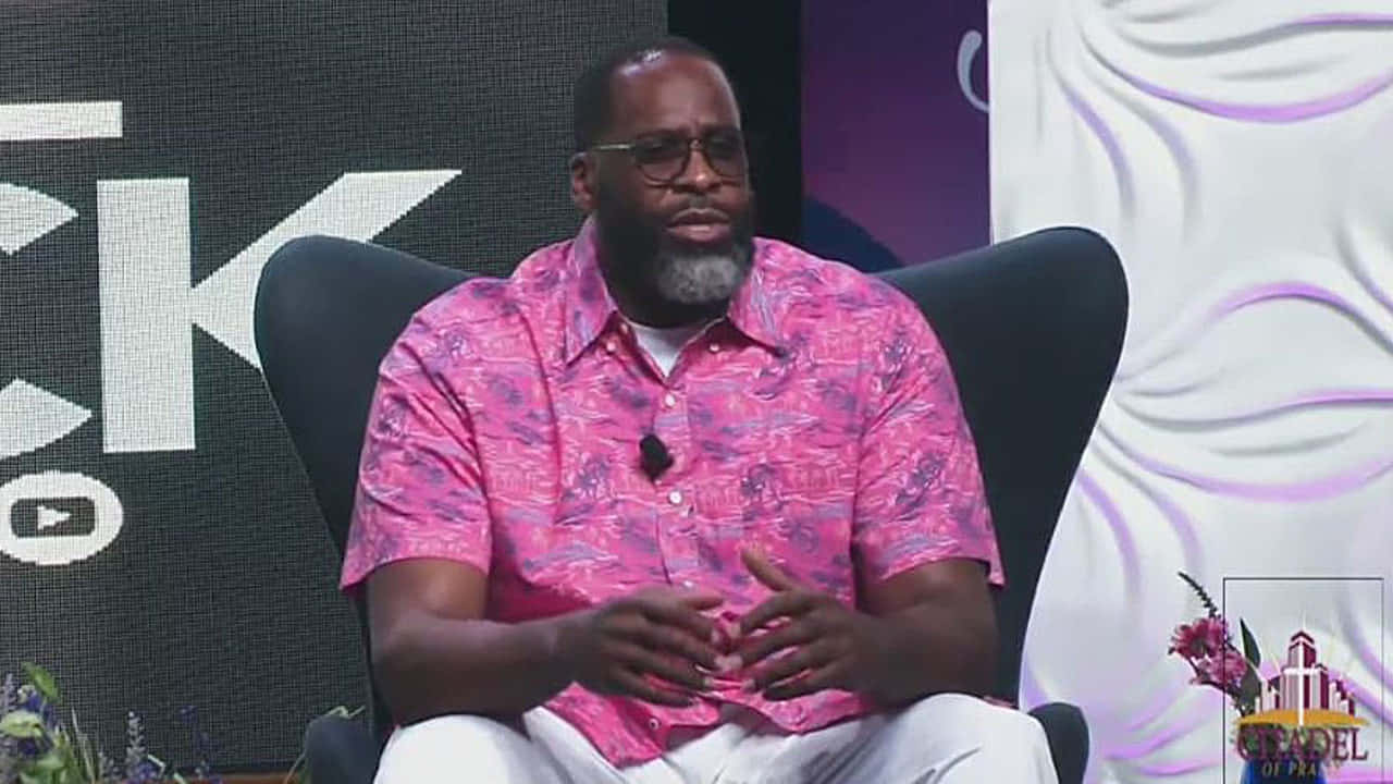 Kwame Kilpatrick In A Formal Attire Background