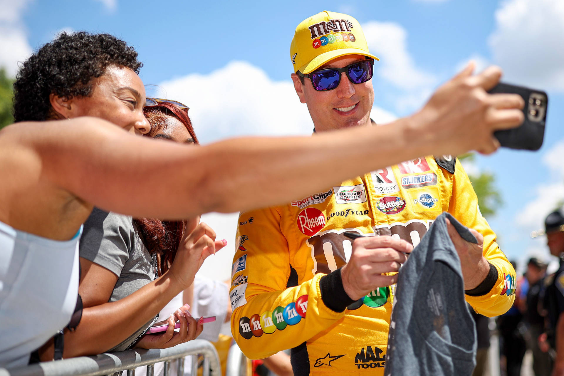 Kyle Busch With Fans Background