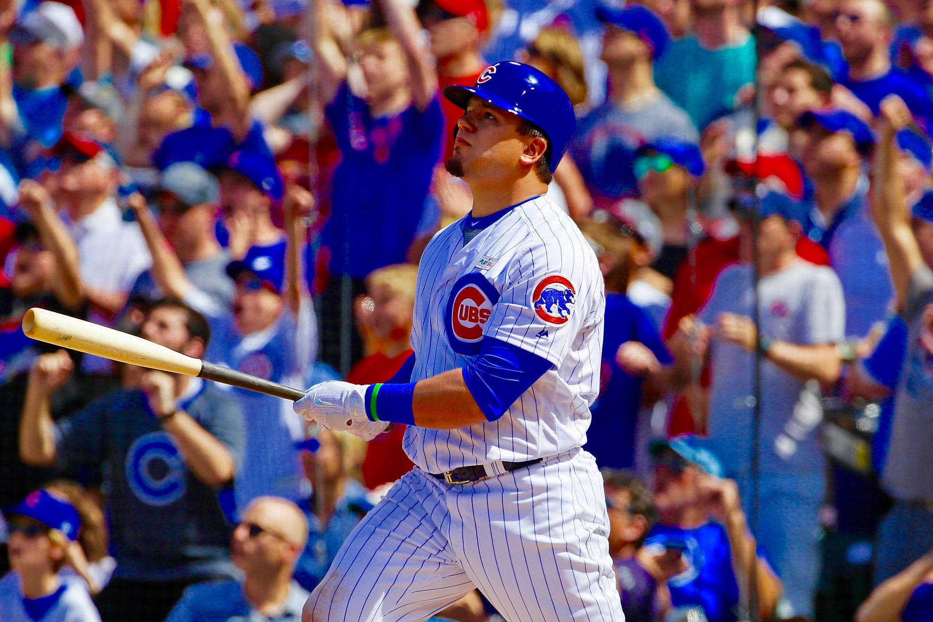 Kyle Schwarber Pointing A Bat Background