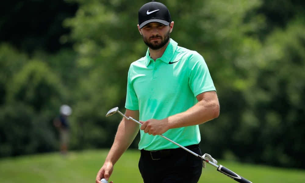 Kyle Stanley Holding Golf Club And Ball