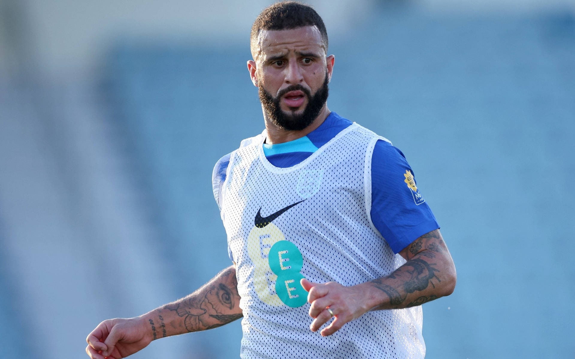 Kyle Walker Looking To Side Worried Background