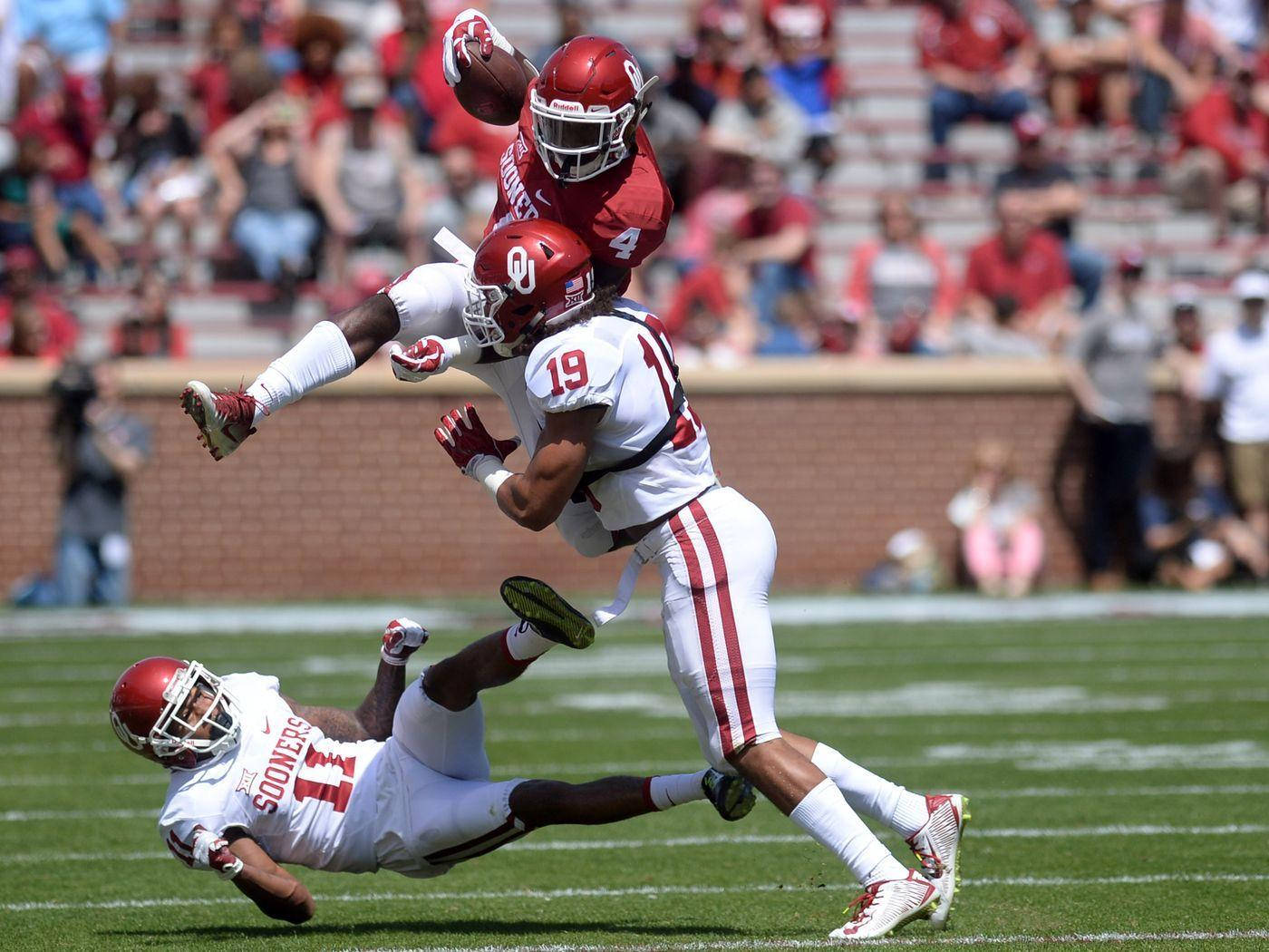 Kyler Murray Jumping Over Teammates